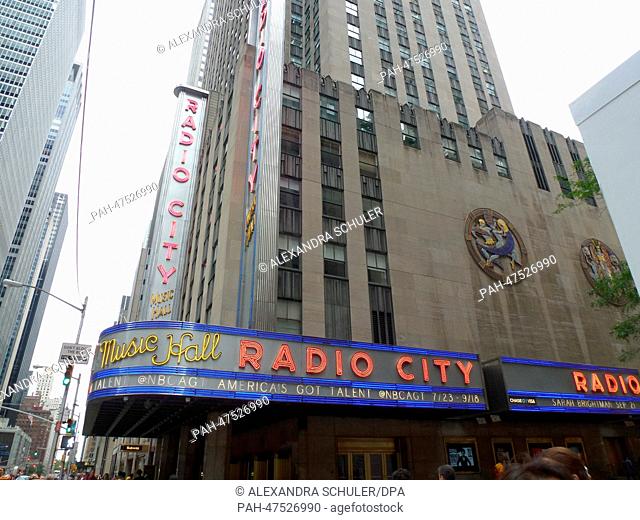 (FILE) - An archive picture, dated 18 August 2014, shows a view of Radio City Music Hall (L) and a skyscraper on 6th Avenue in Manhattan, New York, USA