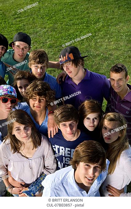 Teen group portrait standing on grass