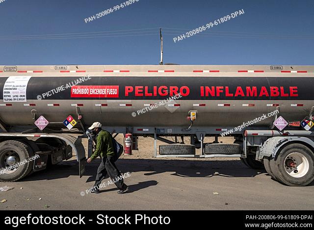 05 August 2020, Bolivia, El Alto: A tanker truck stands on the connecting road between the cities La Paz and Oruro connects