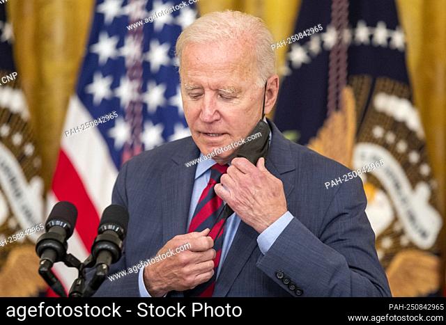 US President Joe Biden delivers remarks on the efforts to get more Americans vaccinated and the spread of the Delta variant in East Room of the White House in...