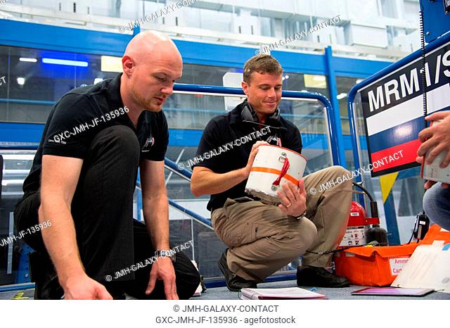 European Space Agency astronaut Alexander Gerst (left) and NASA astronaut Reid Wiseman, both Expedition 4041 flight engineers