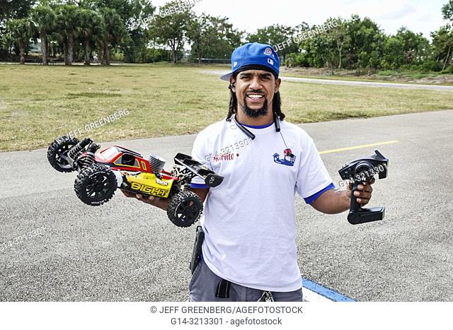 Florida, Fort Ft. Lauderdale, Sunrise, Markham Park, Hispanic, man, remote control model racing racer cars motorized, hobby hobbyist