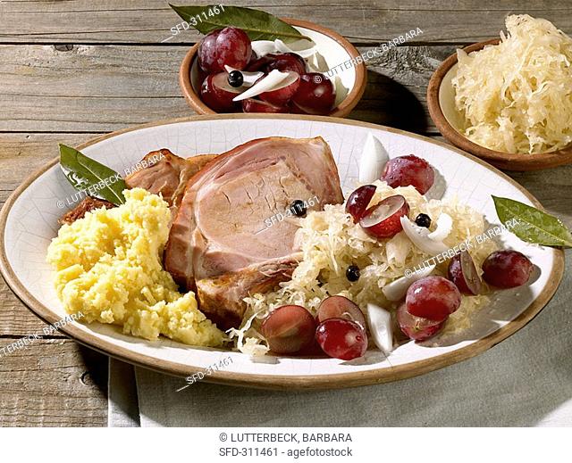 Smoked, cured pork loin with sauerkraut, mashed potato & grapes
