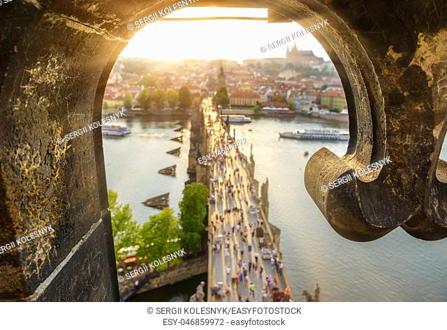 View on Charles Bridge in Prague at sunset from above