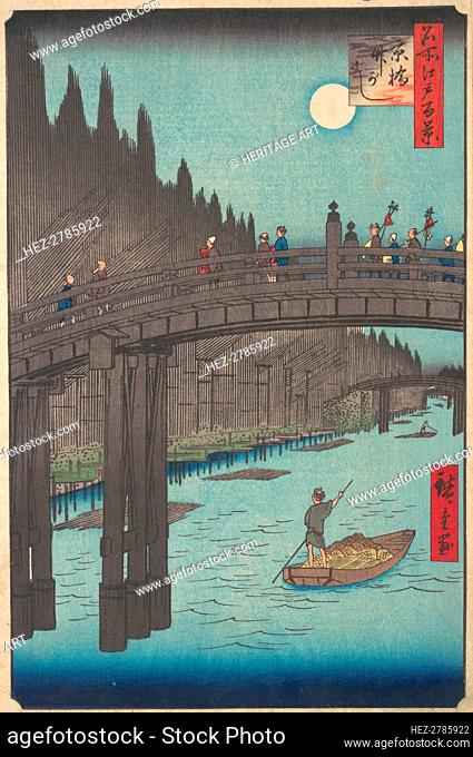 Full Moon Over Canal, with Bridge and Huge Stacks of Bamboo along the Bank, ca. 1857., ca. 1857. Creator: Ando Hiroshige