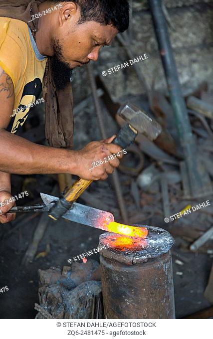 Blacksmiths at work in Puerto Princesa, Palawan, Philippines