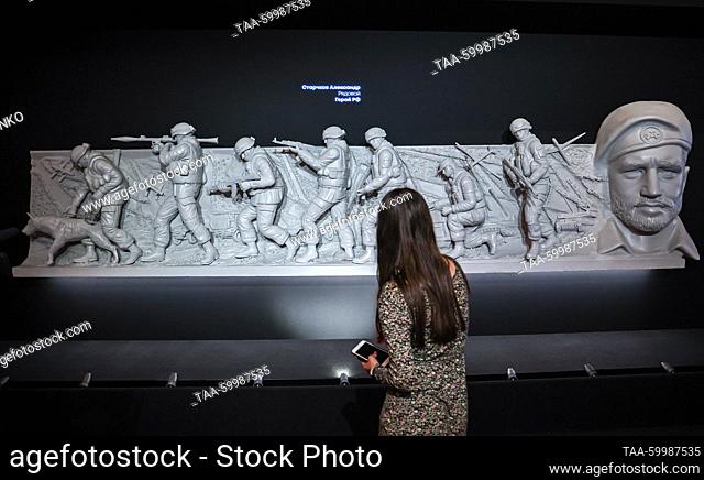 RUSSIA, MOSCOW - JUNE 20, 2023: A woman attends an exhibition dedicated to Russia's special military operation, at Moscow's Victory Museum