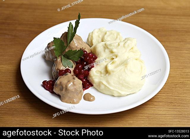 Meatballs, creamed mash and redcurrants