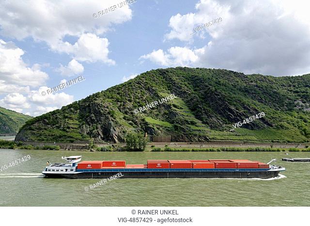 GERMANY, OBERWESEL, 21.08.2014, DEU , GERMANY : A container ship is riding on the Rhine near Obwesel - Oberwesel, Rhineland-Palat, Germany, 21/08/2014