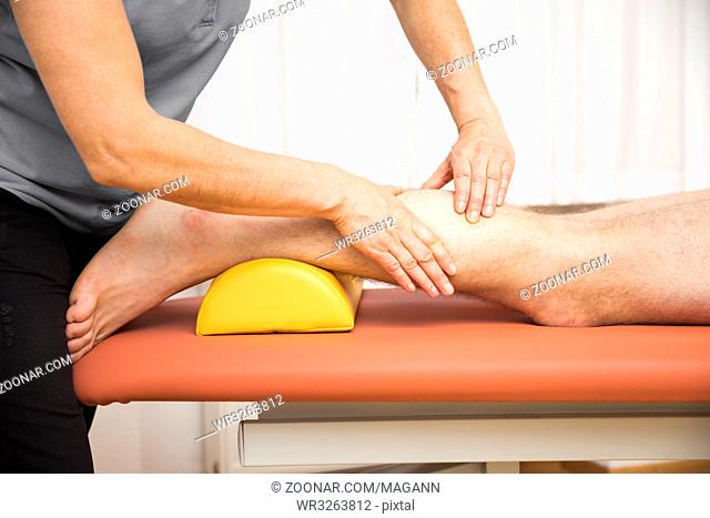 An image of a young man at the physio therapy