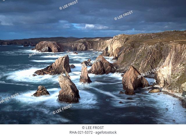 Rugged coastline being pounded by waves on the West coast of Lewis at Mangersta, Isle of Lewis, Outer Hebrides, Scotland, United Kingdom, Europe