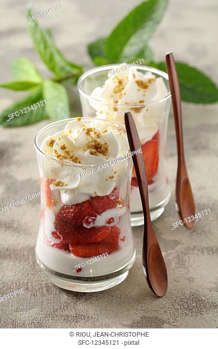 Fontainebleau (cream cheese dessert, France) with strawberries and cream