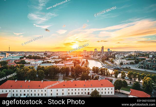 Vilnius, Lithuania. Sunset Sunrise Dawn Over Cityscape In Evening Summer. Beautiful View Of Modern Office Buildings Skyscrapers In Business District New City...