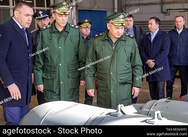 RUSSIA, NIZHNY NOVGOROD REGION - APRIL 6, 2023: Russia's Defence Minister Sergei Shoigu (R front) checks regional enterprises to ensure the fulfilment of the...