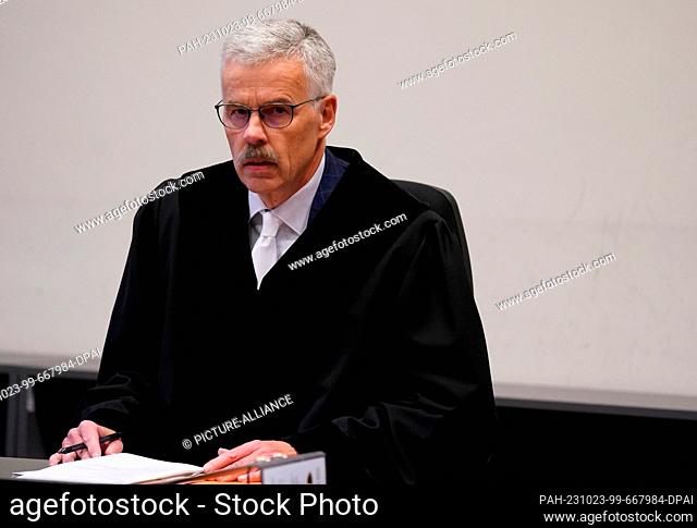 23 October 2023, Hamburg: Norbert Sakuth, presiding judge at the Higher Regional Court, sits in the courtroom in the Criminal Justice Building at the start of...
