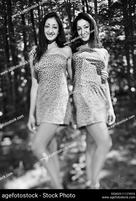 Female twins posing