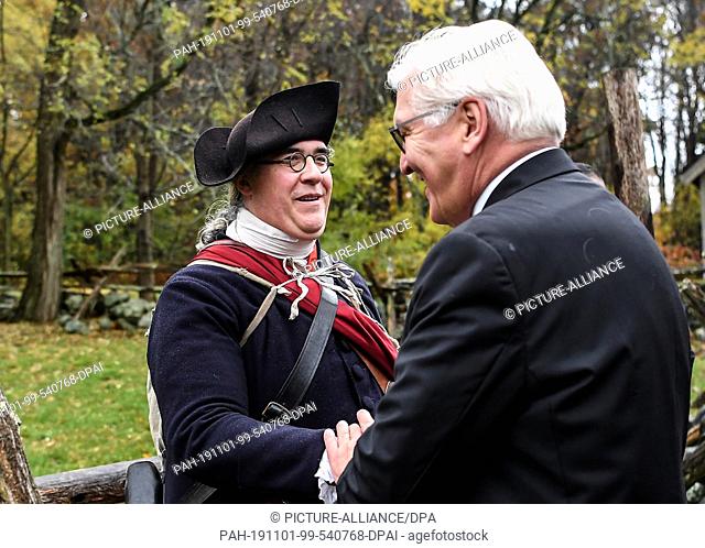 31 October 2019, US, Boston: Federal President Frank-Walter Steinmeier is accompanied on a walk through the Minute Man National Historical Park by a ranger...