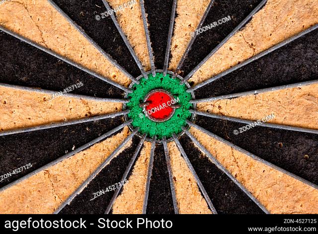 Close-up of a very old dartboard, isolated