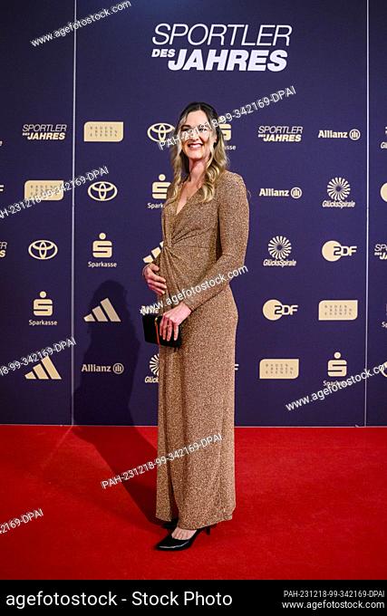 17 December 2023, Baden-Württemberg, Baden-Baden: Denise Herrmann-Wick stands on the red carpet in the Kurhaus before the ""Sportsperson of the Year 2023""...