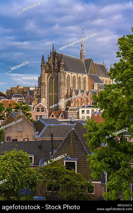 Netherlands, South Holland, Leiden, Houses in front of Hooglandse Kerk cathedral