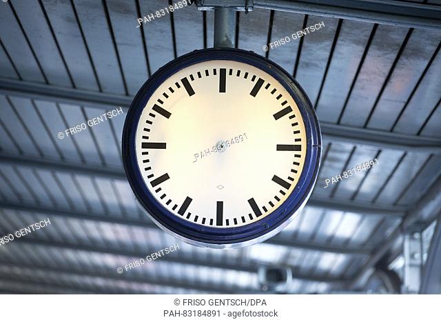 A broken station clock hangs above the platform at the train station in Bad Bentheim,  Germany, 30 August 2016. After raising the train platform