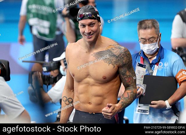 29 July 2021, Japan, Tokio: Swimming: Olympics, men, 100m freestyle, final at Tokyo Aquatics Centre. Caeleb Dressel from USA celebrates gold