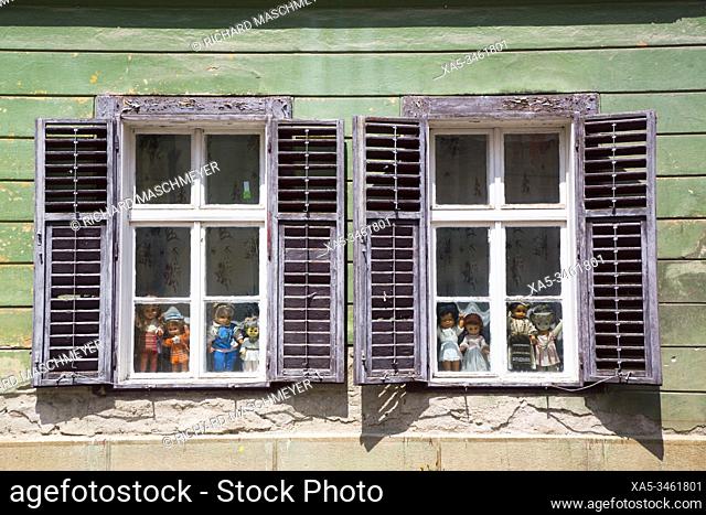 Dolls in Window, Sibiu, Transylvania Region, Romania
