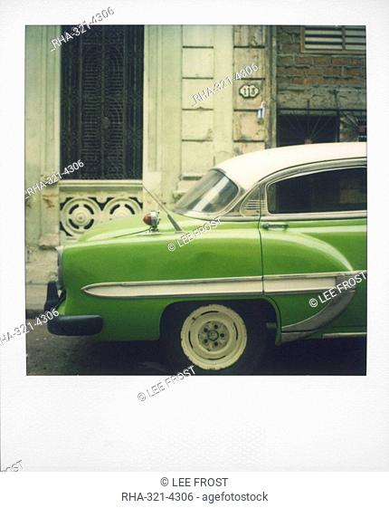 Polaroid of profile of green classic American car parked on street, Vinales, Cuba, West Indies, Central America