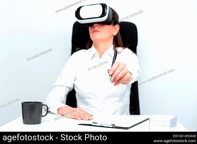 Woman Wearing Goggles And Learning Skill With Virtual Reality Simulator