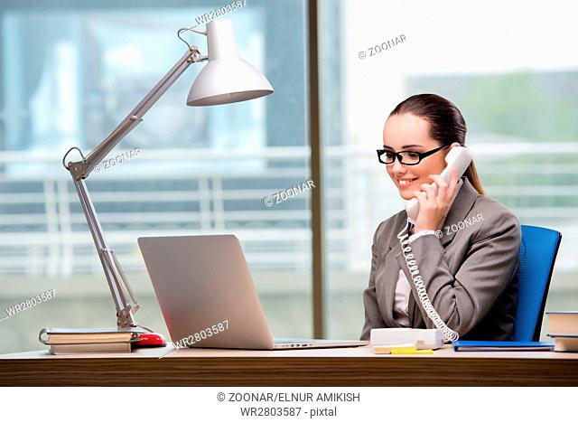 Call center operator working at her desk