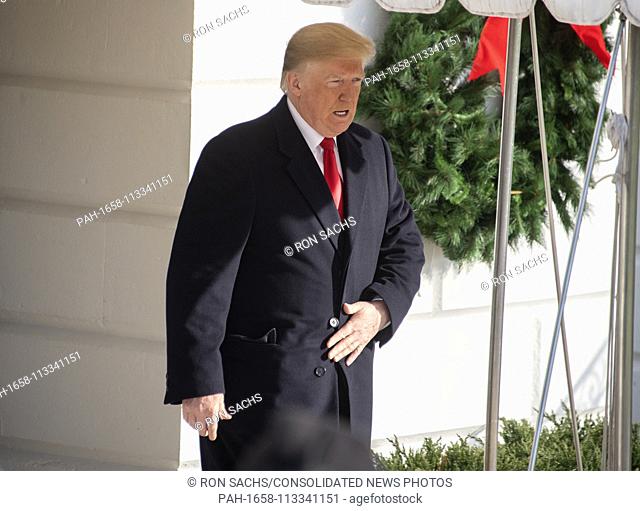 United States President Donald J. Trump departs the South Portico prior to making remarks to the press at the White House in Washington