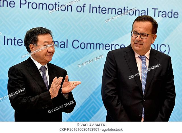 Jiang Zengwei (left), China Vice Minister of Commerce and Jan Mladek (right), Czech Industry and Trade Minister speak at a press conference at the international...