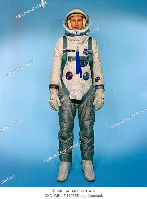 Test subject Fred Spross, Crew Systems Division, wears the Gemini-9 configured extravehicular spacesuit assembly. The legs are covered with Chromel R