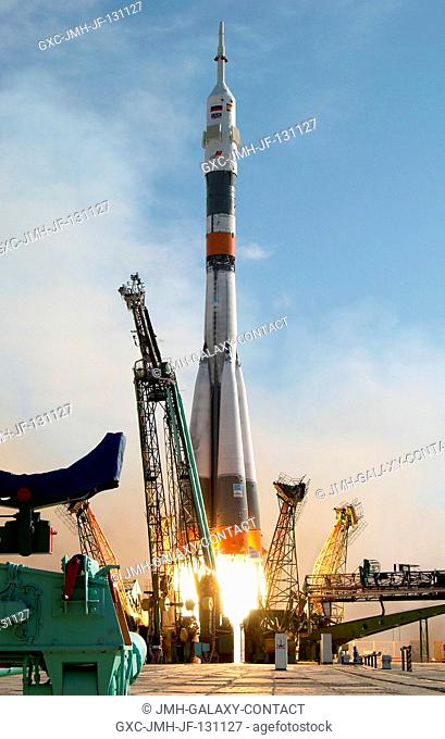 The Soyuz TMA-3 vehicle launches from the Baikonur Cosmodrome in Kazakhstan October 18, 2003, carrying astronaut C. Michael Foale