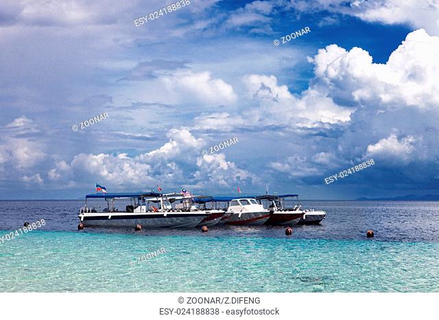 yatch with blue sky and cloud