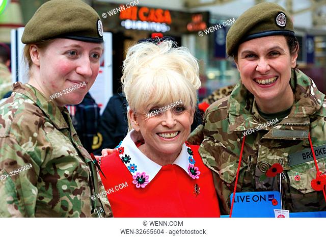 Dame Barbara Windsor and Shane Richie joins the Parachute Regiment Band at Liverpool Street Station for the Royal British Legion’s London Poppy Day