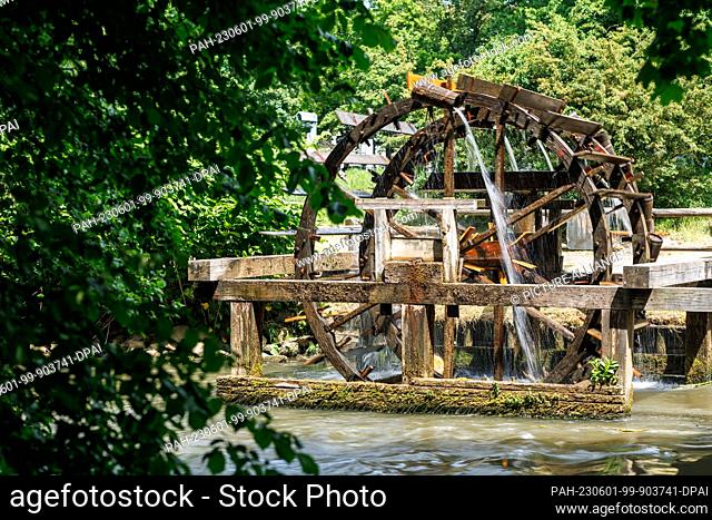 01 June 2023, Bavaria, Nuremberg: The water wheel at the Lederersteg at the Westbad turns with the flow of the Pegnitz. The wooden water wheels were first...