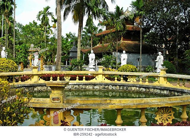 Small pond in the Dhyana Garden surrounded by Buddha Statues, Du Hang Temple, Haiphong, Vietnam