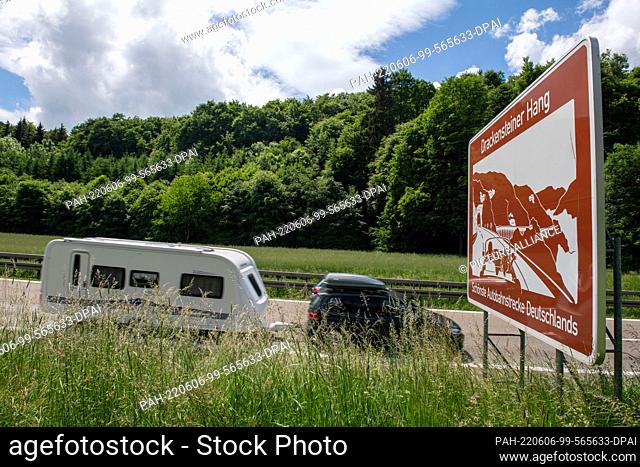 06 June 2022, ---: Cars drive on highway 8 between Ulm and Stuttgart at the Albabstieg Drackensteiner Hang. Heavy travel traffic is expected at the end of the...