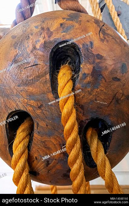 england, hampshire, portsmouth, portsmouth historic dockyard, detail of historic wooden rope pulley block and tackle