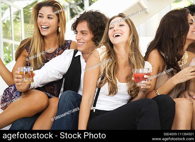 Friends drinking cocktails