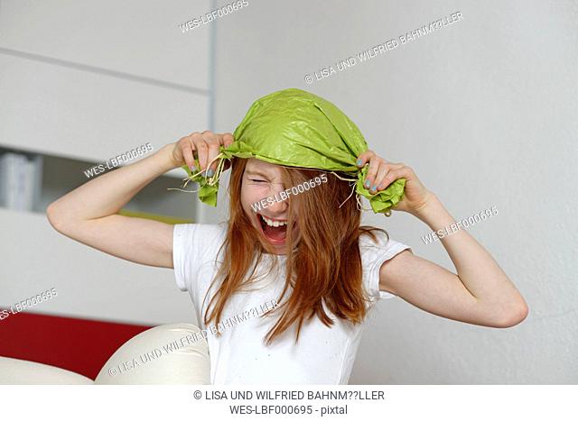 Screaming girl with funny headgear