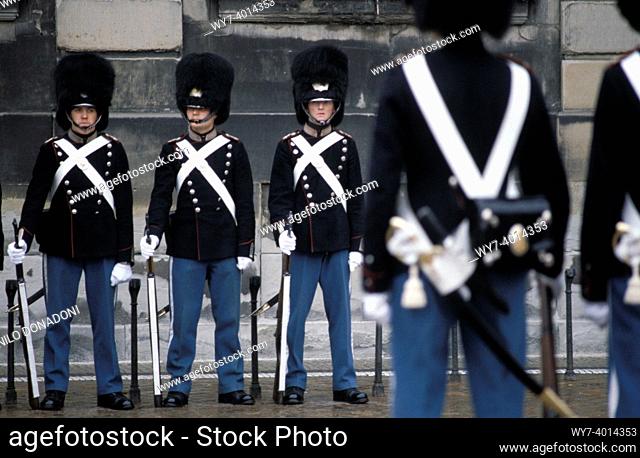 the changing of the guard at the royal palace, copenaghen, denmark