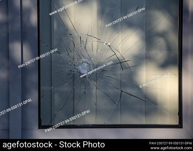 27 July 2023, Berlin: A broken glass pane on a Deutsche Bahn (DB) building is seen in Caroline-Michaelis-Straße in Berlin-Mitte