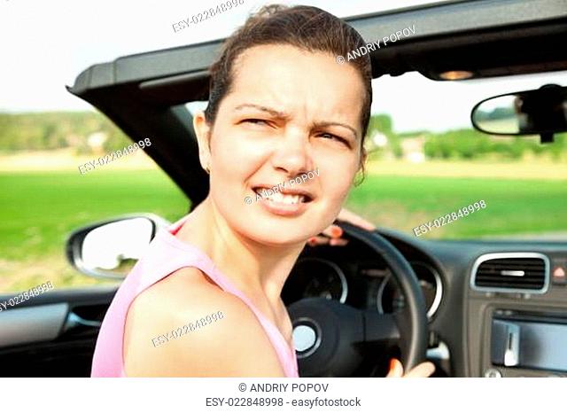 Woman In Car Looking Back
