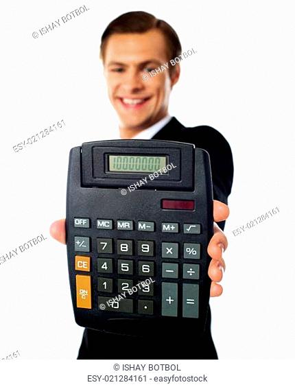 Modern businessman showing calculator