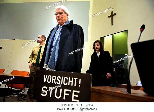 Former BayernLB (Bavarian State Bank) manager Werner Schmidt enters the courtroom in the regional court in Munich, Germany, 27 January 2014