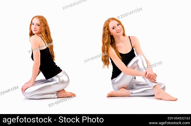 The young redhead girl in tight leggings