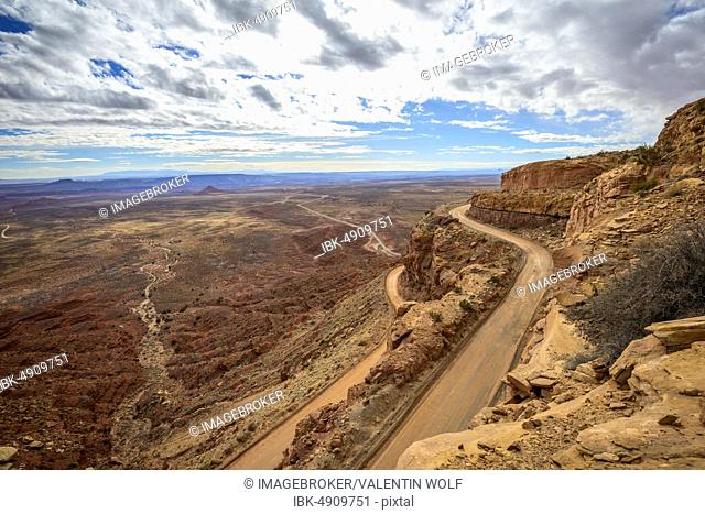 Moki Dugway leads in serpentines through the steep face of the Cedar Mesa, view of the Valley of the Gods, Bears Ears National Monument, Utah State Route 261