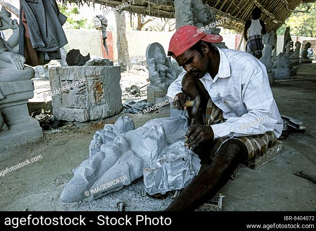 A stone sculptor at work in Mahabalipuram Mamallapuram near Chennai, Tamil Nadu, South India, India, Asia